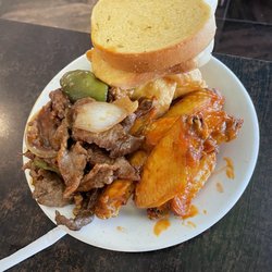Grand Buffet - Garlic bread  buffalo wings pepper steak with green bell and onion