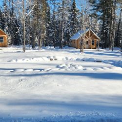 Knotty Pine Trailside Cabins - Cabins with first snowfall