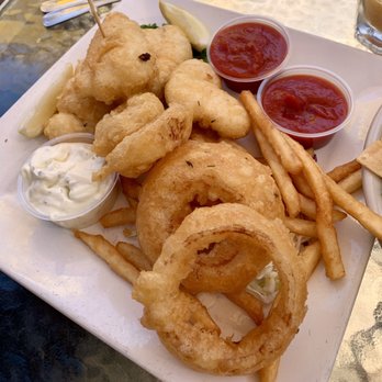 Schooners - Halibut & Chips (1/2 and 1/2 onion rings/fries request accommodated!) - Seafood Near Me - Cayucos, California Schooners - Halibut & Chips (1/2 and 1/2 onion rings/fries request accommodated!) - Seafood Near Me - Cayucos, California