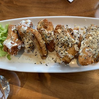 Lumen Detroit - Chicken wings with everything bagel seasoning. The seasoning is a bit of a salt bomb, but the chicken is meaty and fried flawlessly. - Cocktail Bars Near Me - Detroit, Michigan Lumen Detroit - Chicken wings with everything bagel seasoning. The seasoning is a bit of a salt bomb, but the chicken is meaty and fried flawlessly. - Cocktail Bars Near Me - Detroit, Michigan