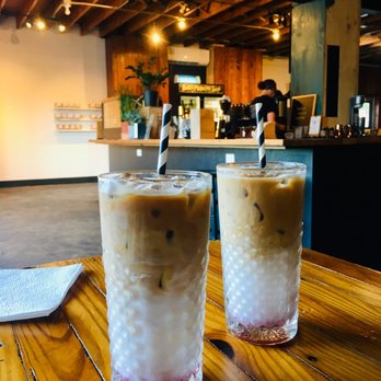 Three Ships Coffee Roasters - The Pungo Latte and inside seating - Coffee & Tea Near Me - Virginia Beach, Virginia