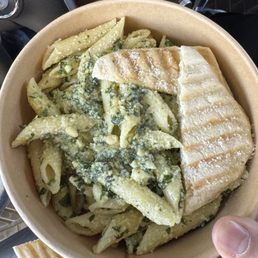 Pesto pasta with grilled flatbread