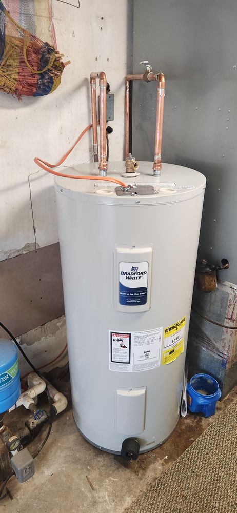 Slide of John's Drain Cleaning and Plumbing Services