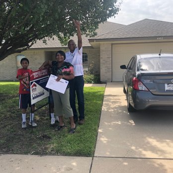 Real Estate Steph - Retired Army Vet Eugene Davis & His Family Removing The For Sale Sign In The Front Of Their New Home - Real Estate Agents Near Me - Killeen, Texas Real Estate Steph - Retired Army Vet Eugene Davis & His Family Removing The For Sale Sign In The Front Of Their New Home - Real Estate Agents Near Me - Killeen, Texas