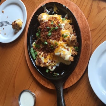 Chili's - Appetizer: Boneless cheese wings. Queso underneath the wings. - Bars Near Me - Harvey, Louisiana Chili's - Appetizer: Boneless cheese wings. Queso underneath the wings. - Bars Near Me - Harvey, Louisiana