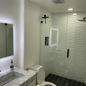 KRS Structures LLC - a bathroom with a toilet and shower - General Contractors Near Me KRS Structures LLC - a bathroom with a toilet and shower - General Contractors Near Me