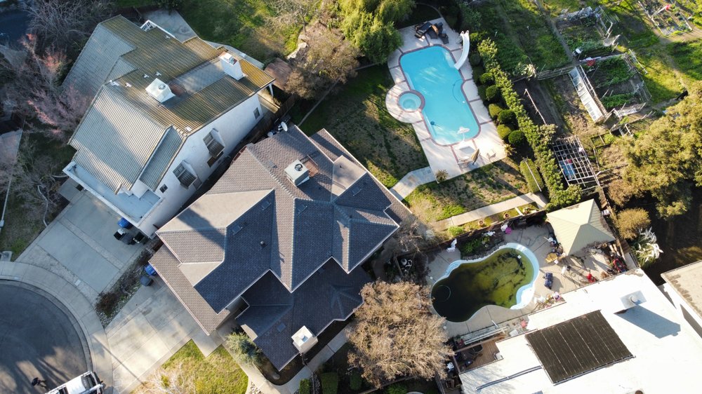 Slide of Legend Roofing Company