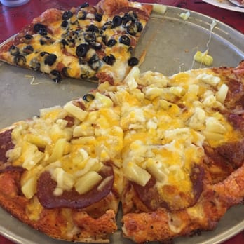 Chico's Pizza Parlor - Large half pepperoni and olive and half pepperoni and pineapple. Not pictured fishtails ale. So good! - Pizza Near Me - Seaview, Washington