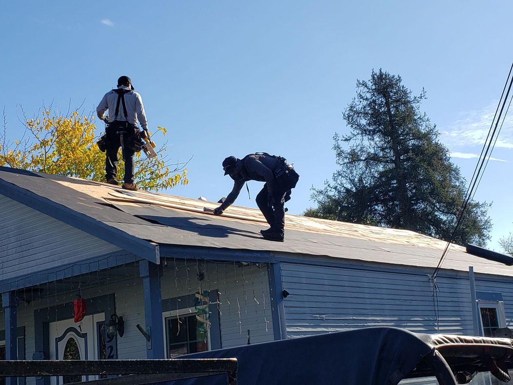 Slide of Henry Roofing