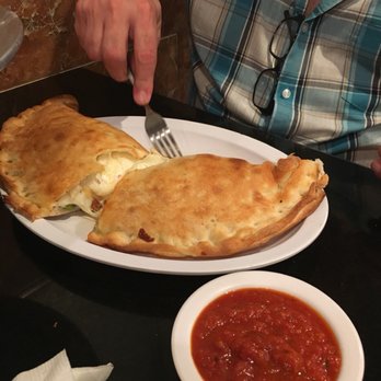 Downtown Pizza - The calzone was yummy and big. Boxed the rest and took it home For a midnight snack. Purr. - Italian Near Me - Lake Worth, Florida Downtown Pizza - The calzone was yummy and big. Boxed the rest and took it home For a midnight snack. Purr. - Italian Near Me - Lake Worth, Florida