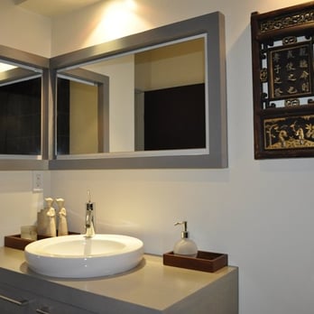 Martinovsky Construction - a sink and mirror in a bathroom - General Contractors Near Me - Scotts Valley, California Martinovsky Construction - a sink and mirror in a bathroom - General Contractors Near Me - Scotts Valley, California