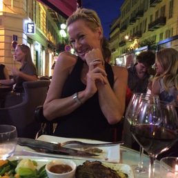 My wife enjoying our lovely dinner