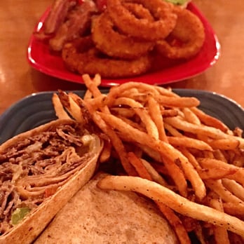 Little Purity - Philly cheesesteak wrap, shoe string fries, and a mountain of onion rings (there's a burger hiding in the back). So good. - Diners Near Me - Brooklyn, New York