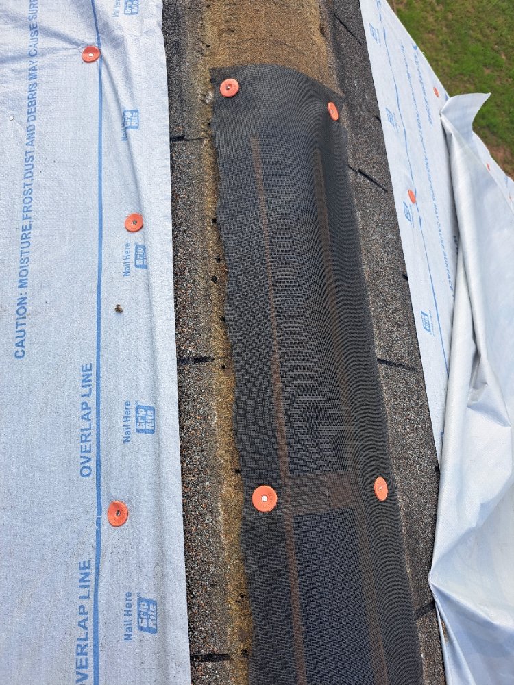 Slide of Mike's roofing and repairs