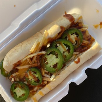 Atomic Dogs - a hot dog in a styrofoam container - Street Vendors Near Me