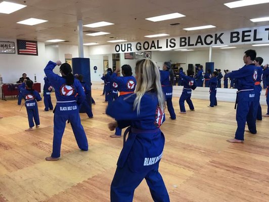 NORCO MARTIAL ARTS - The focus of our Norco martial arts school is on character development, physical fitness, and self-defense, rather than fighting. Our overarching goal is in building our student’s self-esteem.
As soon as you become a martial arts student at Black Belt Academy, you join a community that works together toward:
Better focus and concentration
Greater self-discipline and mental toughness
Improved strength, stamina, and flexibility
Personal safety and competency in self-defense
… and, most importantly, increased self-confidence.
Give us a call and ask about our 4-week Special! NORCO MARTIAL ARTS - The focus of our Norco martial arts school is on character development, physical fitness, and self-defense, rather than fighting. Our overarching goal is in building our student’s self-esteem.
As soon as you become a martial arts student at Black Belt Academy, you join a community that works together toward:
Better focus and concentration
Greater self-discipline and mental toughness
Improved strength, stamina, and flexibility
Personal safety and competency in self-defense
… and, most importantly, increased self-confidence.
Give us a call and ask about our 4-week Special!