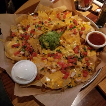 BJ's Restaurant & Brewhouse - Loaded nachos with chicken - New American Near Me - Dallas, Texas BJ's Restaurant & Brewhouse - Loaded nachos with chicken - New American Near Me - Dallas, Texas
