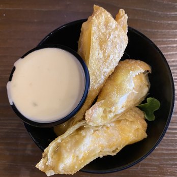 The Sneaky Beagle - Mac & Cheese Springs Rolls served with a side of queso. - Seafood Near Me - Myrtle Beach, South Carolina
