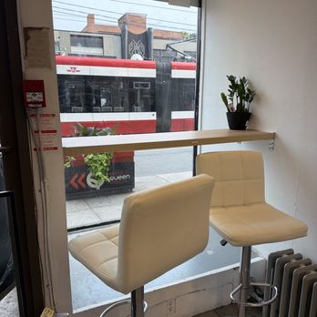 Mari Coffee - Cute table for two perfect for people watching on Queen. - Coffee & Tea Near Me - Toronto, Ontario