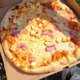 Special order pizza with ham, cheese, Pineapple