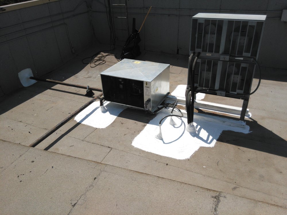 Slide of Benitez Roofing & Waterproofing