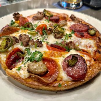 Old Chicago Pizza + Taproom - Meat pizza - Pizza Near Me - Hays, Kansas