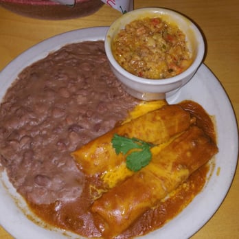 Lupe Tortilla - Tamale, cheese rice, and refried beans - Tex-Mex Near Me - Houston, Texas Lupe Tortilla - Tamale, cheese rice, and refried beans - Tex-Mex Near Me - Houston, Texas