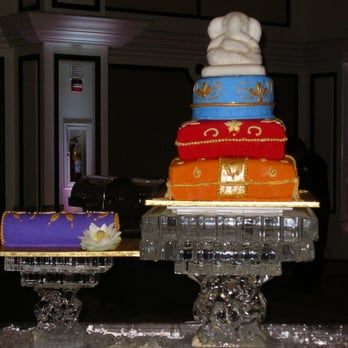 Custom Cake Studio - Ganesh in abstract form was the brides choice for this topper - Custom Cakes Near Me - Orlando, Florida Custom Cake Studio - Ganesh in abstract form was the brides choice for this topper - Custom Cakes Near Me - Orlando, Florida