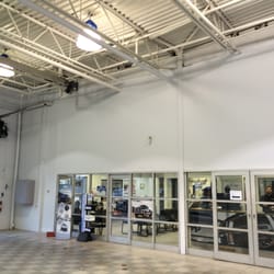 St Louis Handyman Services - Garage after -Pressure washing -New paint Much more brighter!