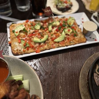 Hard Rock Cafe - Three Cheese & Roma Tomato Flatbread - American Near Me - Hollywood, Florida Hard Rock Cafe - Three Cheese & Roma Tomato Flatbread - American Near Me - Hollywood, Florida
