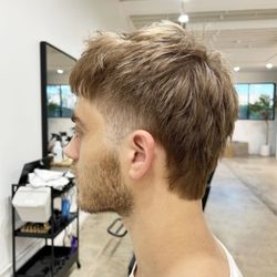 Eddie's Edition - Mid Wilshire - Textured men's cut with soft fade sides, layered top, and clean neckline for a modern yet effortless look