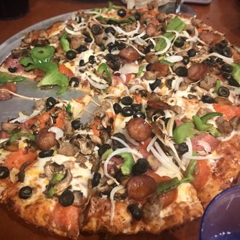 Round Table Pizza - King Arthur's Supreme Pizza, couldn't take a fast enough shot lol, I liked the sauce better than their white. - Pizza Near Me - Citrus Heights, California