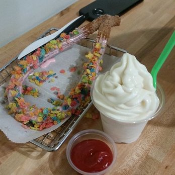 DULCE Churro Cafe - Churro with strawberry glaze, dipped in fruity pebbles served with a side of mango dipping & vanilla soft serve - Desserts Near Me - Gilbert, Arizona