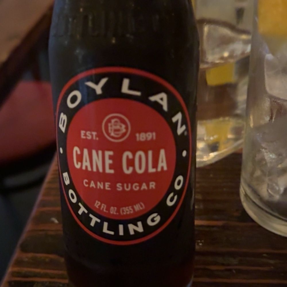 Santa Panza - Boylan Cane Cola is a tribute to the frontman of the British rock band T-Rex, Marc Bolan, who tragically passed away in a car wreck in 1977 - Pizza Near Me - Brooklyn, New York Santa Panza - Boylan Cane Cola is a tribute to the frontman of the British rock band T-Rex, Marc Bolan, who tragically passed away in a car wreck in 1977 - Pizza Near Me - Brooklyn, New York