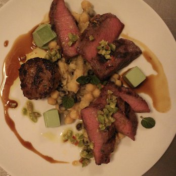 Eden - Lamb Loin with pistachio-yogurt panna cotta, ceci neri, castelvetrano, ginger, lemon. A little over seasoned but tasty! - New American Near Me - Chicago, Illinois