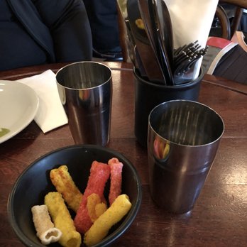 Dishoom - Pani (water) served in steel cups, per tradition. :) - Indian Near Me - London, XGL Dishoom - Pani (water) served in steel cups, per tradition. :) - Indian Near Me - London, XGL