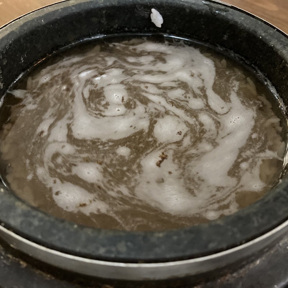 Cho Dang Soon Tofu - They pour water in stonepot to enjoy soaked nutty brown rice at the bottom - Korean Near Me - Toronto, Ontario Cho Dang Soon Tofu - They pour water in stonepot to enjoy soaked nutty brown rice at the bottom - Korean Near Me - Toronto, Ontario