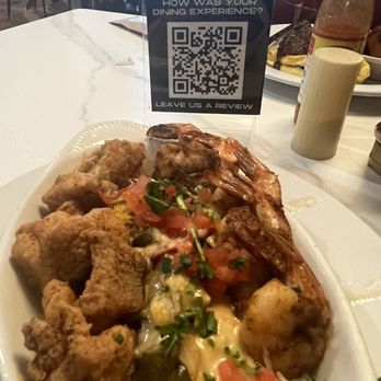 T's Brunch Bar - Not on the menu but shrimp and grits with catfish nuggets. - Breakfast & Brunch Near Me - Atlanta, Georgia