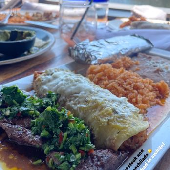 Margaritaville - Skirt steak with Shrimp Enchilada - Seafood Near Me - Capitola, California Margaritaville - Skirt steak with Shrimp Enchilada - Seafood Near Me - Capitola, California