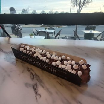 Churro Station - Gourmand churro filled with Nutella and topped with Nutella and marshmallows. - Desserts Near Me - Birmingham, Alabama