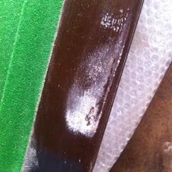 Affordable Billiards - White marks (not flash on picture) and finger prints in the varnish