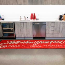 Rose Physical Therapy - Patient treatment floor area for Rose Physical Therapy with Love How You Feel company motto.