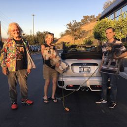 Here is a photo of the day I bought the car with my amazing sales Rep and my two dogs and husband. Here is a photo of the day I bought the car with my amazing sales Rep and my two dogs and husband.