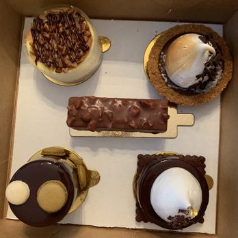 Alliance Bakery & Cafe - Turtle cheesecake, smore tart, macadamia bar, Anne, Zoe (left to right, top to bottom) - Bakeries Near Me - Chicago, Illinois Alliance Bakery & Cafe - Turtle cheesecake, smore tart, macadamia bar, Anne, Zoe (left to right, top to bottom) - Bakeries Near Me - Chicago, Illinois