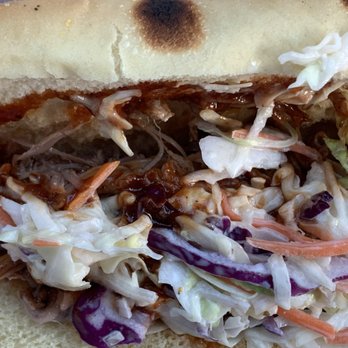Fat Pig BBQ - Showing the proportion of pulled pork to slaw and bun - Barbeque Near Me - Edmonds, Washington Fat Pig BBQ - Showing the proportion of pulled pork to slaw and bun - Barbeque Near Me - Edmonds, Washington