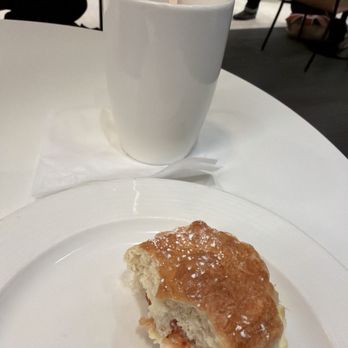 American Express Centurion Lounge - Coffee, scone with jam & clotted cream. - Airport Lounges Near Me - Longford, XGL American Express Centurion Lounge - Coffee, scone with jam & clotted cream. - Airport Lounges Near Me - Longford, XGL