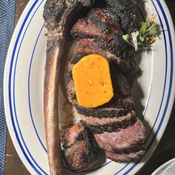 Wicked Butcher - Tomahawk with lobster butter and missing au poivre sauce - Steakhouses Near Me - Dallas, Texas Wicked Butcher - Tomahawk with lobster butter and missing au poivre sauce - Steakhouses Near Me - Dallas, Texas