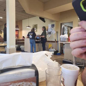 Huddle House - a person taking a picture of their food - American Near Me - Frystown, Pennsylvania Huddle House - a person taking a picture of their food - American Near Me - Frystown, Pennsylvania