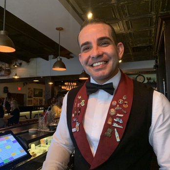 Cafe La Trova - Our charming bartender - Cocktail Bars Near Me - Miami, Florida