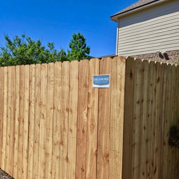 Sagamore Fence & Deck - Take a look at this freshly installed wooden privacy fence, standing strong with warm, natural wood tones under a clear blue sky. - Fences & Gates Near Me - Georgetown, Texas Sagamore Fence & Deck - Take a look at this freshly installed wooden privacy fence, standing strong with warm, natural wood tones under a clear blue sky. - Fences & Gates Near Me - Georgetown, Texas